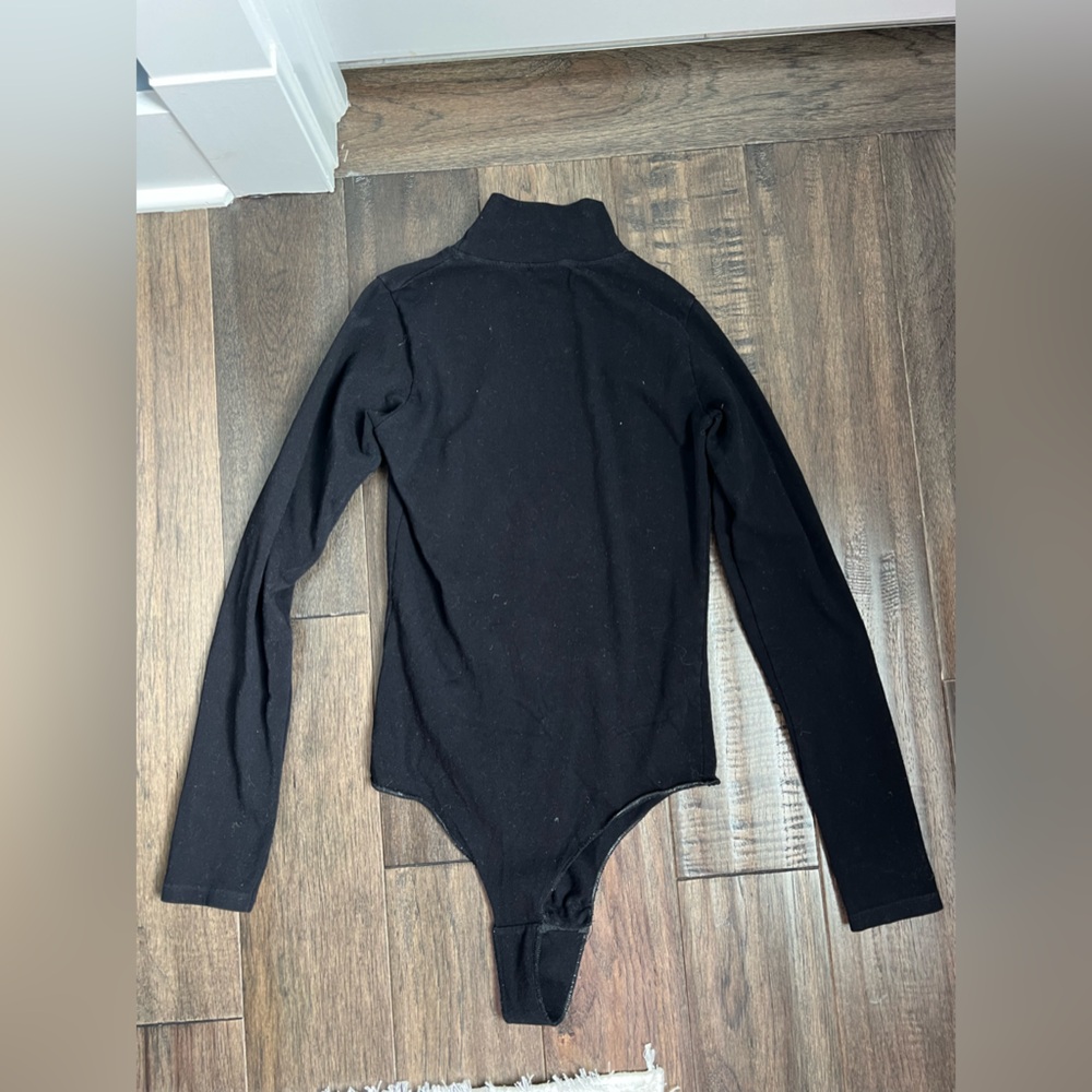 Black long sleeve turtleneck bodysuit